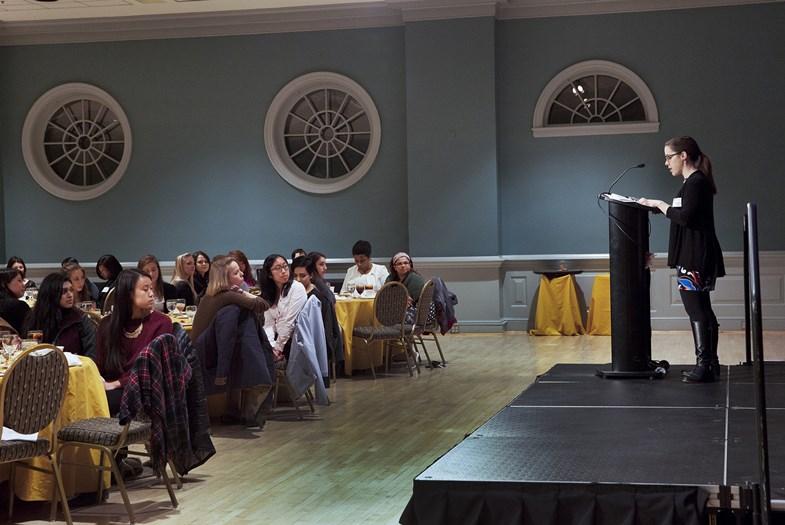 Female speaker on stage
