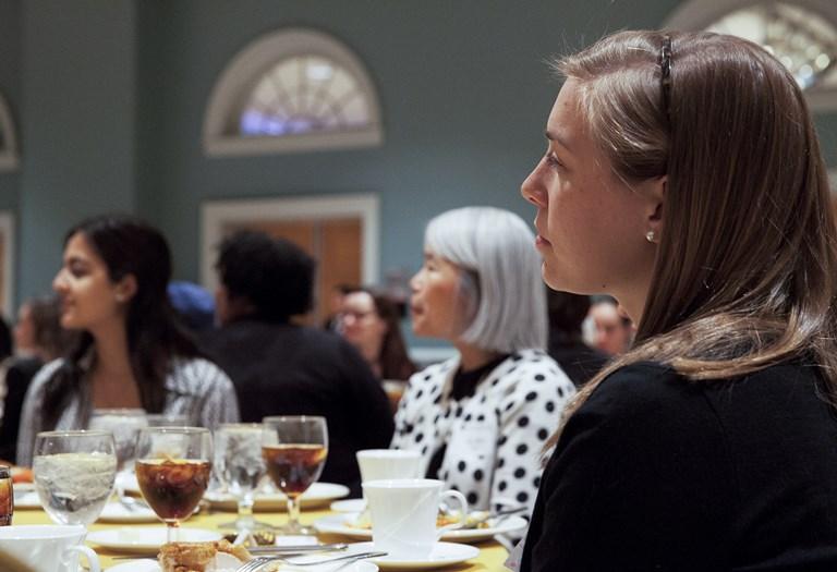 female audience listening