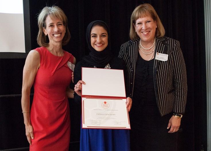scholarship recipient and two presenters 