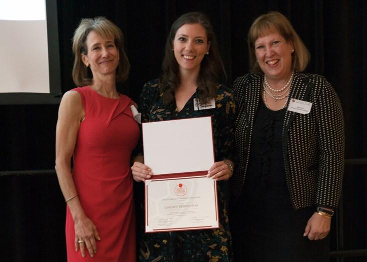 scholarship recipient and two presenters 
