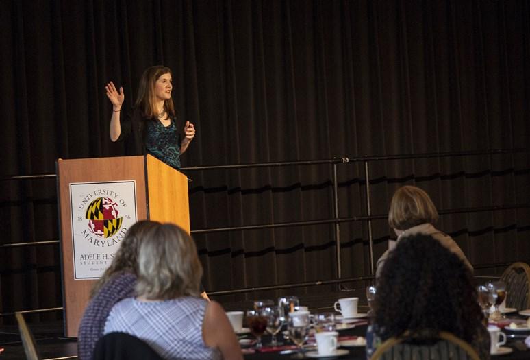 woman speak at podium 